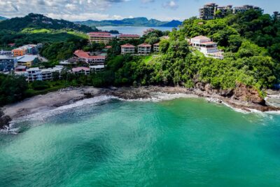 Aerial view of Playa Flamingo showing the white sand beach and Flamingo Marina